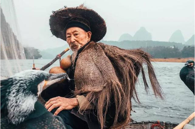 桂林渔夫“武林高手照”火爆海外！华裔摄影师：路过全世界，在中国找到江湖